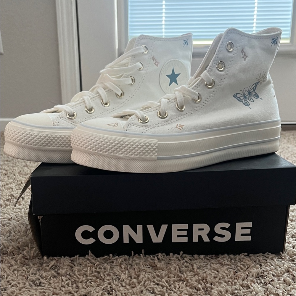 Converse Women's White High-Tops with Blue Accents